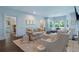 Spacious living room filled with natural light, plush seating, and stylish accents, perfect for relaxing and entertaining at 414 E Wesley Ne Rd, Atlanta, GA 30305