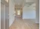Bright and inviting foyer featuring hardwood floors and elegant trim details at 136 Dalston Cv, Stockbridge, GA 30281