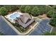 A beautiful clubhouse with covered porch, lush landscaping and convenient parking at 1870 Marcia Overlook Dr, Cumming, GA 30041