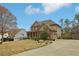 Charming two-story home with well-manicured lawn and inviting curb appeal at 1870 Marcia Overlook Dr, Cumming, GA 30041