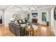 Comfortable living room with hardwood floors, fireplace, coffered ceiling and natural light at 1870 Marcia Overlook Dr, Cumming, GA 30041
