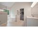Elegant bathroom with a freestanding tub, glass shower, and a convenient door to the walk-in closet at 2772 Hillgrove Dr, Dacula, GA 30019