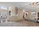 Inviting living room with a soaring ceiling, a staircase, and an open layout perfect for entertaining at 2772 Hillgrove Dr, Dacula, GA 30019