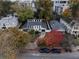 Charming home aerial view of a modern suburban property, landscaped yard, and neighborhood streets at 549 Ne Parkway Ne Dr, Atlanta, GA 30308