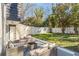 Spacious backyard with patio, seating, and mature trees, ideal for outdoor living at 549 Ne Parkway Ne Dr, Atlanta, GA 30308