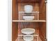 Organized cabinet space with tiered shelving, perfect for efficient kitchen storage solutions at 549 Ne Parkway Ne Dr, Atlanta, GA 30308