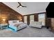 Large bedroom with brick accent wall, ample light, and contemporary furnishings at 549 Ne Parkway Ne Dr, Atlanta, GA 30308