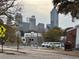 Urban streetscape in Atlanta featuring sidewalks, buildings, and the city skyline, showcasing a lively neighborhood at 549 Ne Parkway Ne Dr, Atlanta, GA 30308