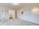Hallway featuring two closets and an opening to another room at 165 Cooper E Cv, Fayetteville, GA 30215