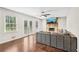 Bright living room with hardwood floors, fireplace, and access to the backyard at 1752 Shadybrook Ct, Lawrenceville, GA 30043