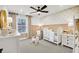Adorable Bedroom with soft colors, a rocking horse, and plenty of space for a crib at 272 Rockledge Sw Bnd, Powder Springs, GA 30127