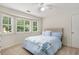 Cozy bedroom with lots of natural light and a comfortable bed at 360 Spindle Ct, Sandy Springs, GA 30350