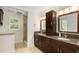 Elegant main bathroom with dual vanities, granite countertops, and a glass-enclosed shower at 360 Spindle Ct, Sandy Springs, GA 30350
