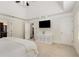 Tranquil main bedroom featuring tray ceilings, neutral walls, and ample closet space at 360 Spindle Ct, Sandy Springs, GA 30350
