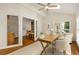 Office with vaulted ceilings, ceiling fan, hardwood floors, large windows, and natural light at 360 Spindle Ct, Sandy Springs, GA 30350