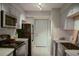 Efficient kitchen featuring stainless appliances and ample counter space at 125 Rue Fontaine, Lithonia, GA 30038