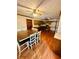 Spacious kitchen and dining area with hardwood floors and updated appliances at 1905 Sidneys Cv, Lawrenceville, GA 30043