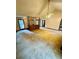 Large living room with vaulted ceilings and open layout, ready for updates at 1905 Sidneys Cv, Lawrenceville, GA 30043