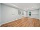 Large basement area with recessed lighting, vinyl flooring, and a small window at 223 Falling Water Way, Woodstock, GA 30188
