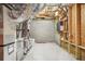 Unfinished basement with HVAC unit and plumbing system, offering ample space for storage at 223 Falling Water Way, Woodstock, GA 30188