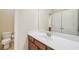 Bathroom with modern sink, vanity and toilet at 223 Falling Water Way, Woodstock, GA 30188