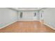 Spacious living room with hard wood floors and natural light at 223 Falling Water Way, Woodstock, GA 30188