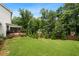 Expansive backyard featuring lush green grass and a well-manicured landscape at 3710 Robinson Walk Ct, Marietta, GA 30068
