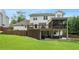 A view of the house's rear, showing the deck and large backyard at 3710 Robinson Walk Ct, Marietta, GA 30068
