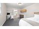 Versatile basement bedroom featuring a bed, desk, and storage cabinets, offering a functional and comfortable space at 3710 Robinson Walk Ct, Marietta, GA 30068