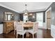 Dining room with hardwood floors and a chandelier over the table at 3710 Robinson Walk Ct, Marietta, GA 30068