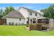 The back of the house featuring the deck, screened porch, and large yard at 3710 Robinson Walk Ct, Marietta, GA 30068