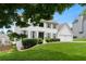 Charming white two-story home with a manicured lawn, garage, and tasteful landscaping at 3710 Robinson Walk Ct, Marietta, GA 30068