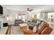 Spacious living room features a cozy seating arrangement and access to the outdoors at 3710 Robinson Walk Ct, Marietta, GA 30068