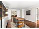 Well-lit office with a view into the living room with built-in shelving and fireplace at 3710 Robinson Walk Ct, Marietta, GA 30068