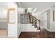 Staircase with wood and iron railings and hardwood floors at 3710 Robinson Walk Ct, Marietta, GA 30068