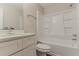 A bathroom featuring a sink, toilet, bathtub and shower at 5352 Windfern Ct, Stone Mountain, GA 30088
