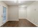 Bright dining area with hardwood floors and sliding door to backyard at 5352 Windfern Ct, Stone Mountain, GA 30088