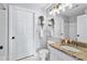 Bathroom featuring granite counters, neutral walls, and a shower-tub combination at 1075 Peachtree Walk # A-307, Atlanta, GA 30309