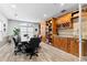 A conference room with a wooden book case and a view of a tree at 1075 Peachtree Walk # A-307, Atlanta, GA 30309