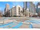 Modern building with balconies in a bustling city environment on a beautiful sunny day at 1075 Peachtree Walk # A-307, Atlanta, GA 30309