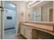 Updated bathroom with walk-in shower, modern fixtures, and granite countertop at 1137 Poplar Log Pl, Austell, GA 30168