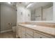 Bathroom featuring a vanity with a speckled countertop, a large mirror, and tile flooring at 1137 Poplar Log Pl, Austell, GA 30168