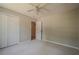 Cozy bedroom with carpet, a double closet, and easy access to a hallway at 1137 Poplar Log Pl, Austell, GA 30168
