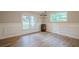 Formal dining room with hardwood floors, wainscoting, and modern lighting at 1137 Poplar Log Pl, Austell, GA 30168
