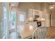 Eat-in kitchen with stainless appliances and plenty of sunlight through large windows at 1137 Poplar Log Pl, Austell, GA 30168