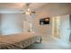 Spacious main bedroom featuring high ceilings, ceiling fan, and attached bathroom at 1137 Poplar Log Pl, Austell, GA 30168