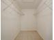 Spacious walk-in closet with carpet floor and wire shelving offering ample storage at 1137 Poplar Log Pl, Austell, GA 30168