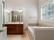 Luxurious bathroom with double vanity, soaking tub, and separate shower at 12 Isabella Ne Ct, Cartersville, GA 30121