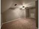 Bedroom with carpet and ceiling fan, and a crawl space door at 12 Isabella Ne Ct, Cartersville, GA 30121