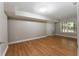 Bedroom featuring vinyl floors, natural light from the window at 12 Isabella Ne Ct, Cartersville, GA 30121